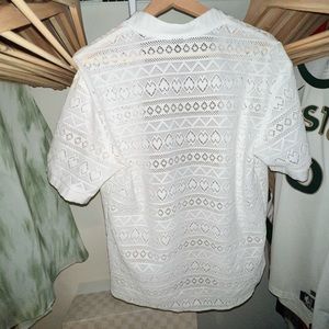 Small white Japanese styled collared shirt. Cut out Inca print patterned Nehru